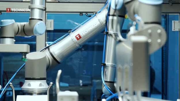 The Technicon TUB Unload & Load Module is an innovative and fully automated plug & play modular cobot solution developed for the global pharma industry. It efficiently handles TUBs and Akylux boxes (Abs) automatically. It improves ergonomics, enhances stability and secures better utilization of valuable human resources. The Technicon TUB Unload & Load combines five flexible, safe and stable Universal Robots cobots: four UR10s - two of those ceiling-mounted - and one UR20. (Copyright: Technicon) The Technicon TUB Unload & Load Module is an innovative and fully automated plug & play modular cobot solution developed for the global pharma industry. It efficiently handles TUBs and Akylux boxes (Abs) automatically. It improves ergonomics, enhances stability and secures better utilization of valuable human resources. The Technicon TUB Unload & Load combines five flexible, safe and stable Universal Robots cobots: four UR10s - two of those ceiling-mounted - and one UR20. (Copyright: Technicon)