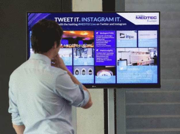 Die Social Media Wall zeigt live Posts und Tweets über die MEDTEC Europe.