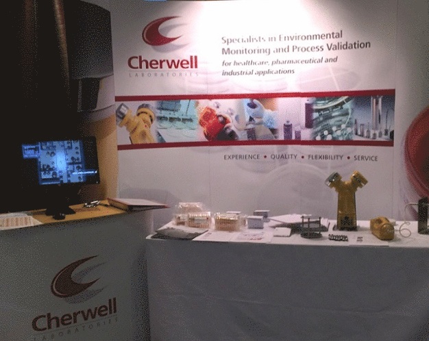 Cherwell Laboratories exhibition stand highlighting its range of cleanroom microbiology solutions.