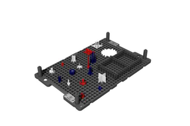 Kunststoffwarenträgersystem „TechTray“ bestückt mit beispielhaften Pins sowie einer exemplarischen, bauteilspezifischen Aussparung.