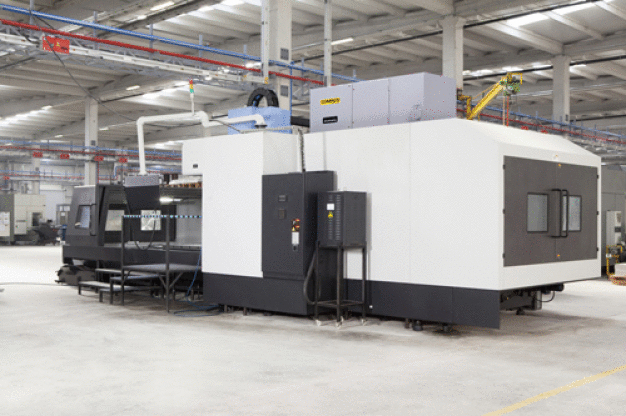 Bild 1: Moderne CNC-Zerspanungsmaschinen führen in der Werkshalle zu einer verstärkten Belastung der Luft mit Schadstoffen. Luftreiniger schaffen hier Abhilfe. (Bild: ISI-Industrieprodukte GmbH) / Fig. 1: Modern CNC cutting machines increase the amount of contaminants in the air in factory buildings; this can be remedied by air purifiers. (Photo: ISI-Industrieprodukte GmbH)