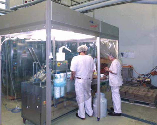 Organic yoghurt filling process. CleanFlowCell® laminar flow housing, clean room class ISO-7. 