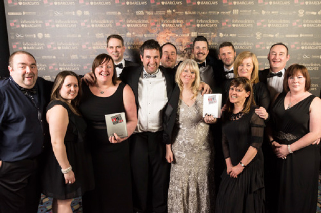 The Connect 2 Cleanrooms’ team collecting one of its two awards at the Red Rose Awards 2014.