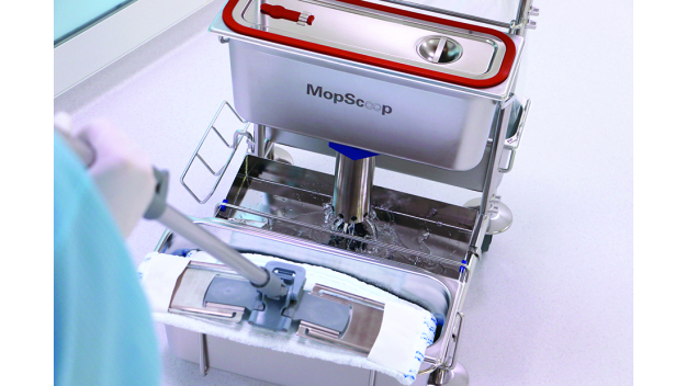 Abbildung 3: Das Dosier- und Tränkungssystem MopScoop. Die Abbildung zeigt die Dosierung der vorgegebenen Flüssigkeitsmenge.
