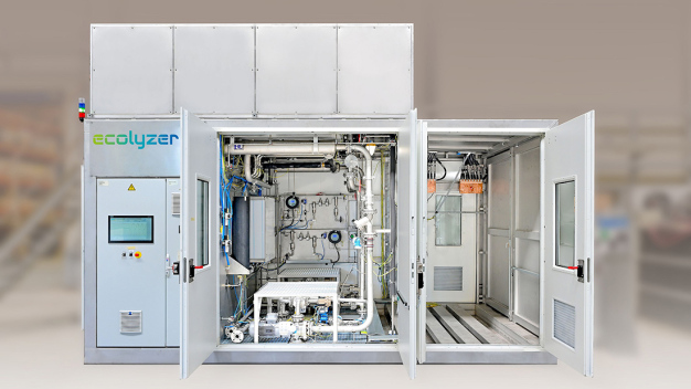 Eine erste Lösung im neuen Geschäftsfeld Elektrolyseure wurde mit einem Prüfstand für die alkalische Druckelektrolyse im September 2023 fertiggestellt. (Bildquelle: Ecoclean GmbH) / An initial solution in the new electrolysers business area was completed in September 2023 with a test rig for alkaline pressure electrolysis. (Picture: Ecoclean GmbH)