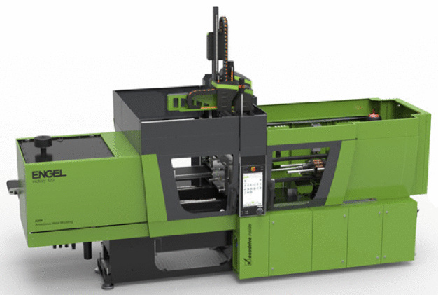 Engel hat die hydraulische victory AMM Spritzgießmaschine gezielt für die Verarbeitung von Amloy Materialien entwickelt. (Bild: ENGEL) / On the basis of its proven hydraulic and tie-bar-less victory range, ENGEL has developed a new injection moulding machine for processing amorphous metals from Heraeus’ Amloy product range. (Picture: ENGEL)