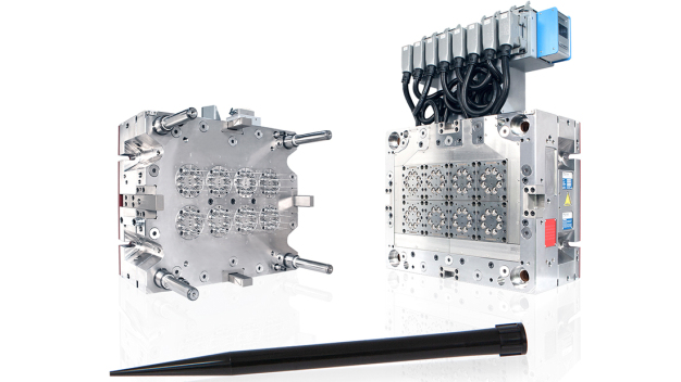 Each männer mould cavity cluster comprises eight removable and replaceable cavities, a  hot runner nozzle head with  eight individual heat controlled  nozzle tips and eight  floating core pilot bushings.  