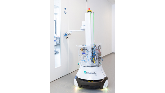 The mobile cleaning and disinfection robot DeKonBot navigates autonomously to critical objects such as door handles and disinfects them. (© Fraunhofer IPA/Photo: Rainer Bez) The mobile cleaning and disinfection robot DeKonBot navigates autonomously to critical objects such as door handles and disinfects them. (© Fraunhofer IPA/Photo: Rainer Bez)